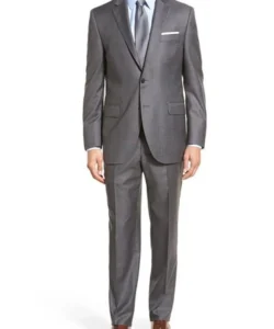 tom ellis in a grey suit