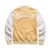 white and yellow varsity jacket